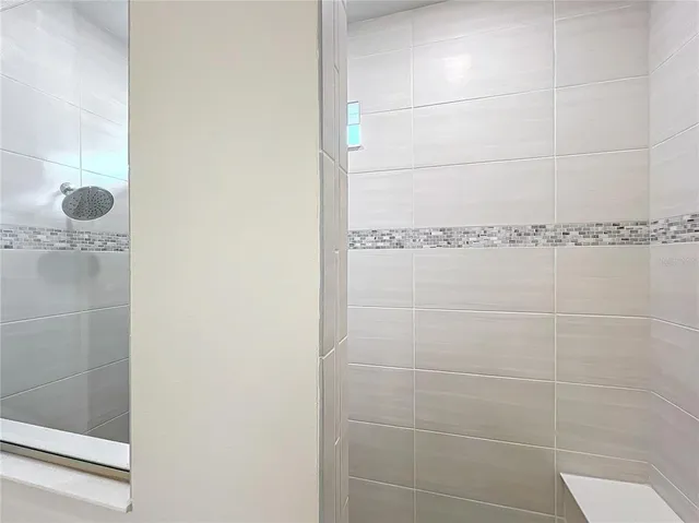 a view of a house with backyard porch and sitting area