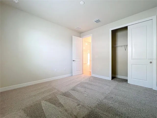 an aerial view of a city with ocean view