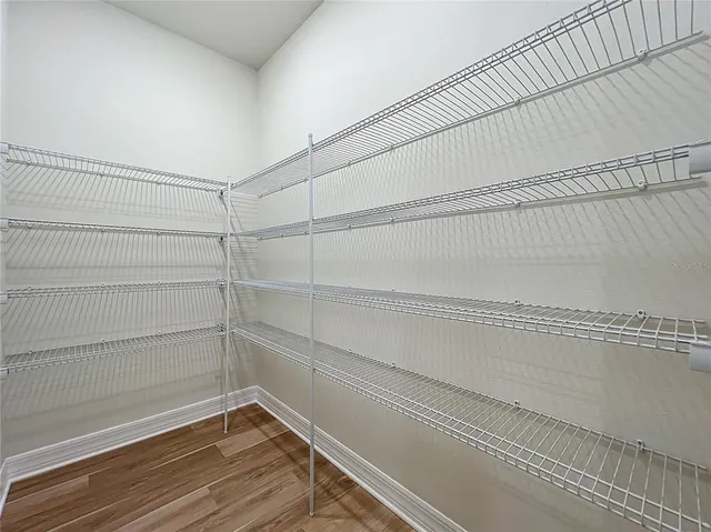 an aerial view of a house with a ocean view