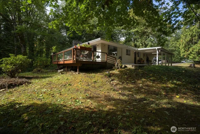 a house with trees in front of it