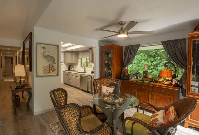 a view of a dining room with furniture window and outside view
