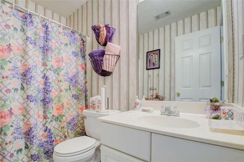 4270 Berkeley Mill Lane Duluth, GA 30096 - Photo 21 of 28 a bathroom with a sink toilet and shower