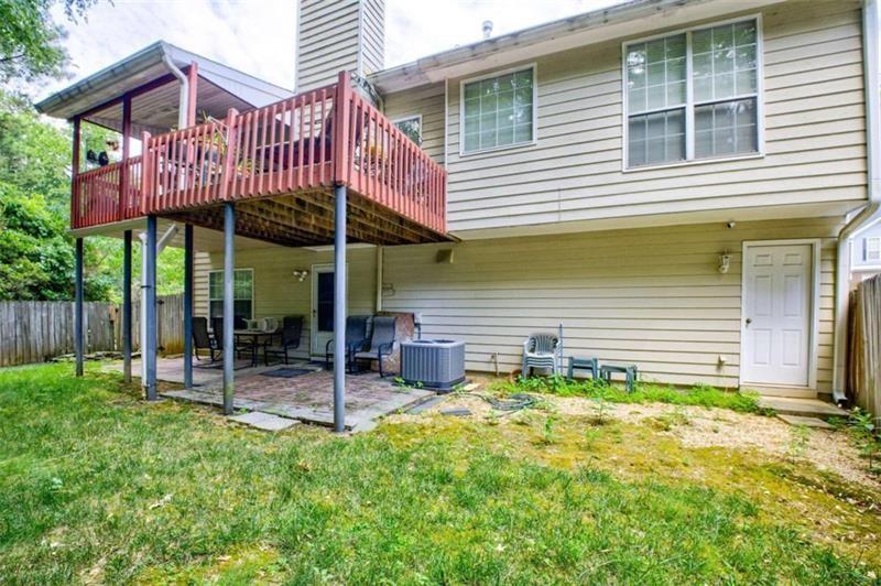 4270 Berkeley Mill Lane Duluth, GA 30096 - Photo 26 of 28 a view of a house with a yard and porch