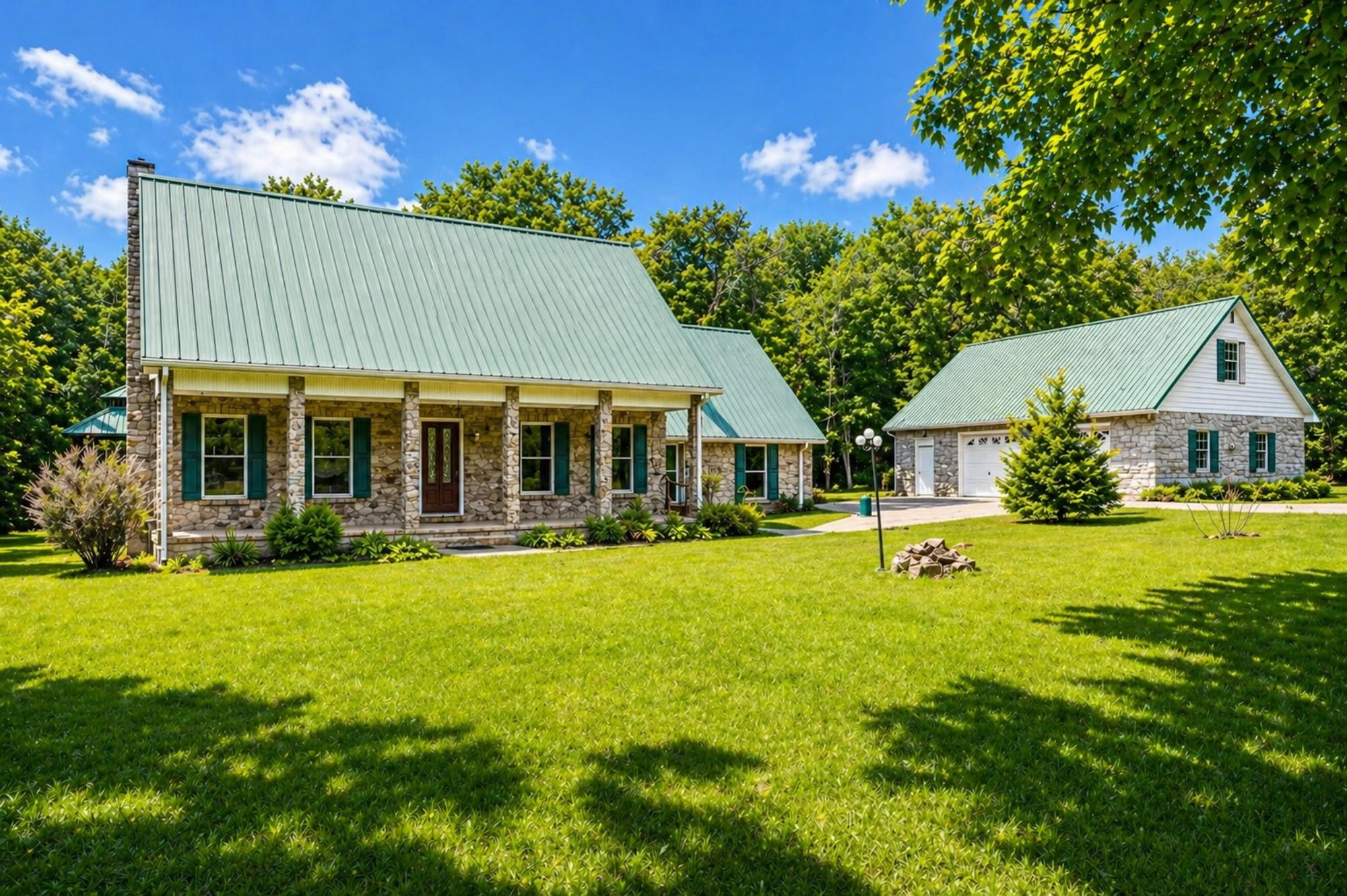 831 Defeated Creek Road Centerville, TN 37033 - Photo 1 of 26 a front view of a house with yard and green space