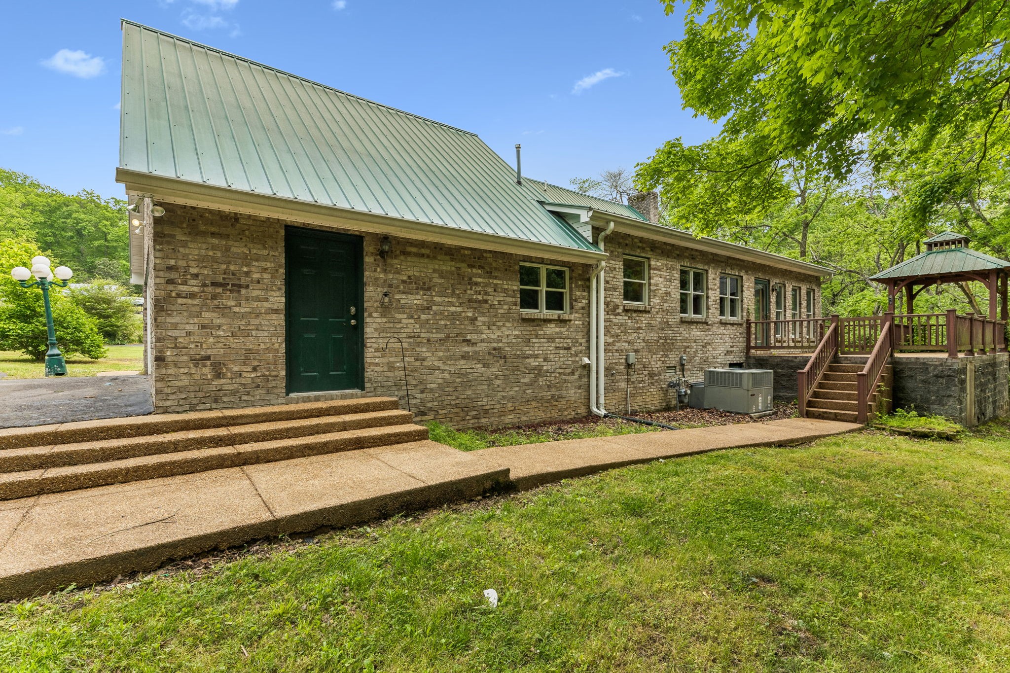 831 Defeated Creek Road Centerville, TN 37033 - Photo 18 of 26 a front view of a house with a yard
