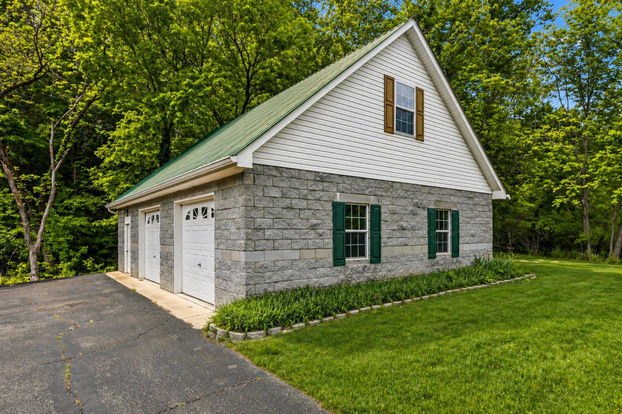 831 Defeated Creek Road Centerville, TN 37033 - Photo 24 of 26 a view of a house with backyard and garden