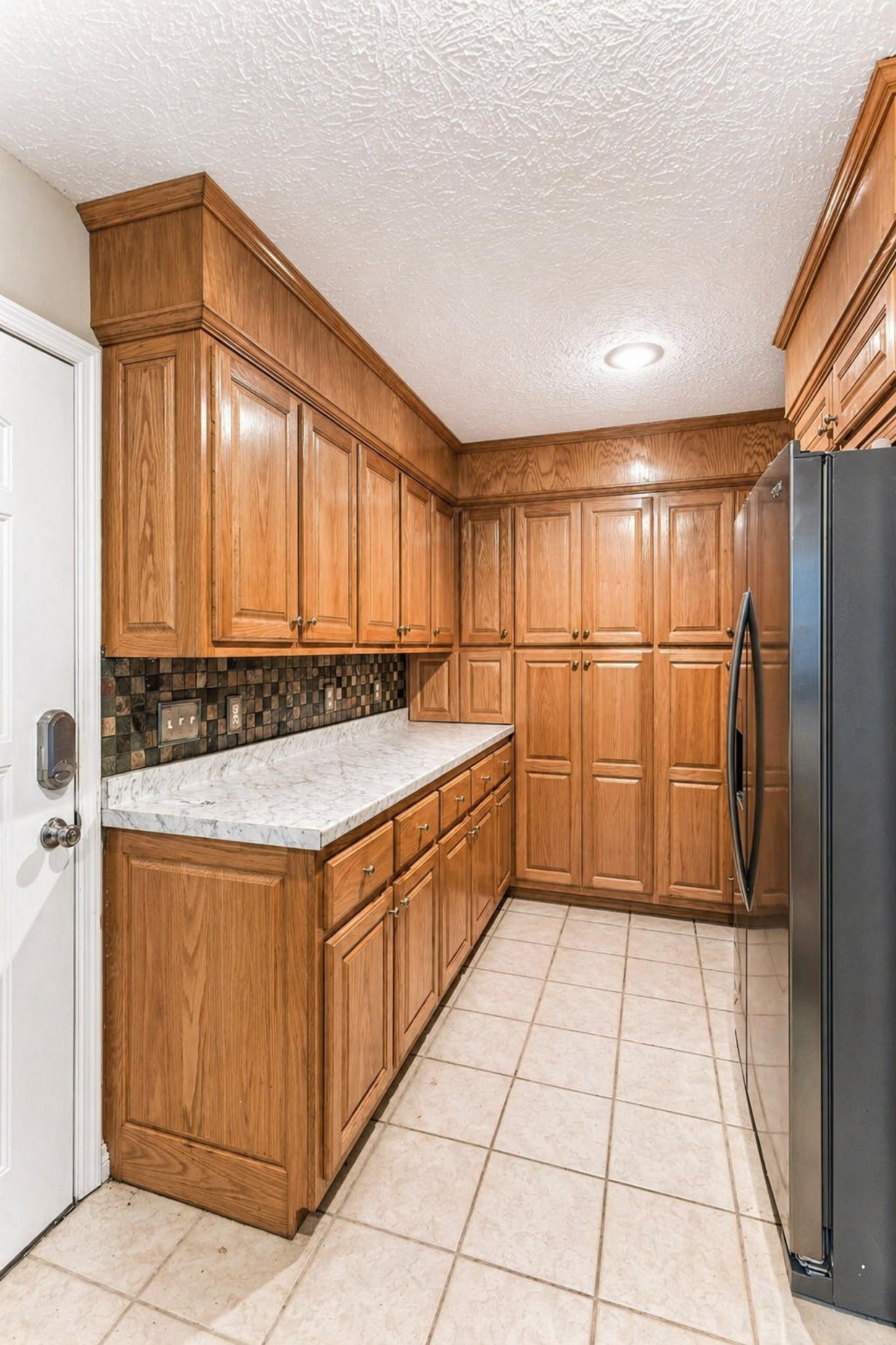 831 Defeated Creek Road Centerville, TN 37033 - Photo 8 of 26 a bathroom with a granite countertop sink and a shower
