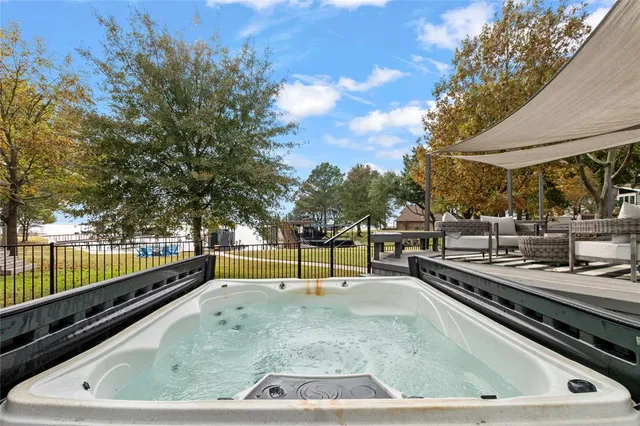a view of a street with a building and a street sign