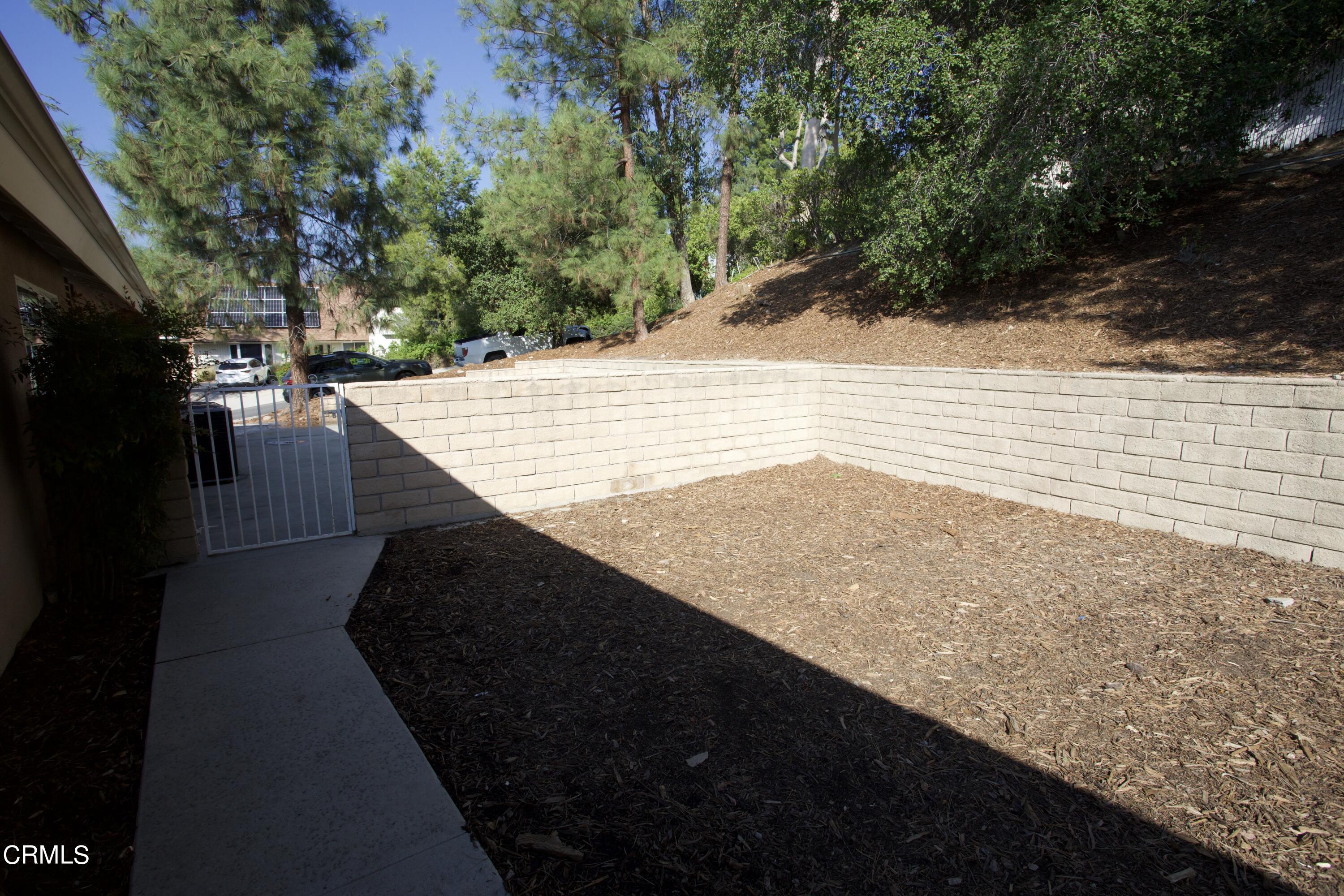 7438 Alpine Way Tujunga, CA 91042 - Photo 25 of 30 a view of an outdoor space and a yard