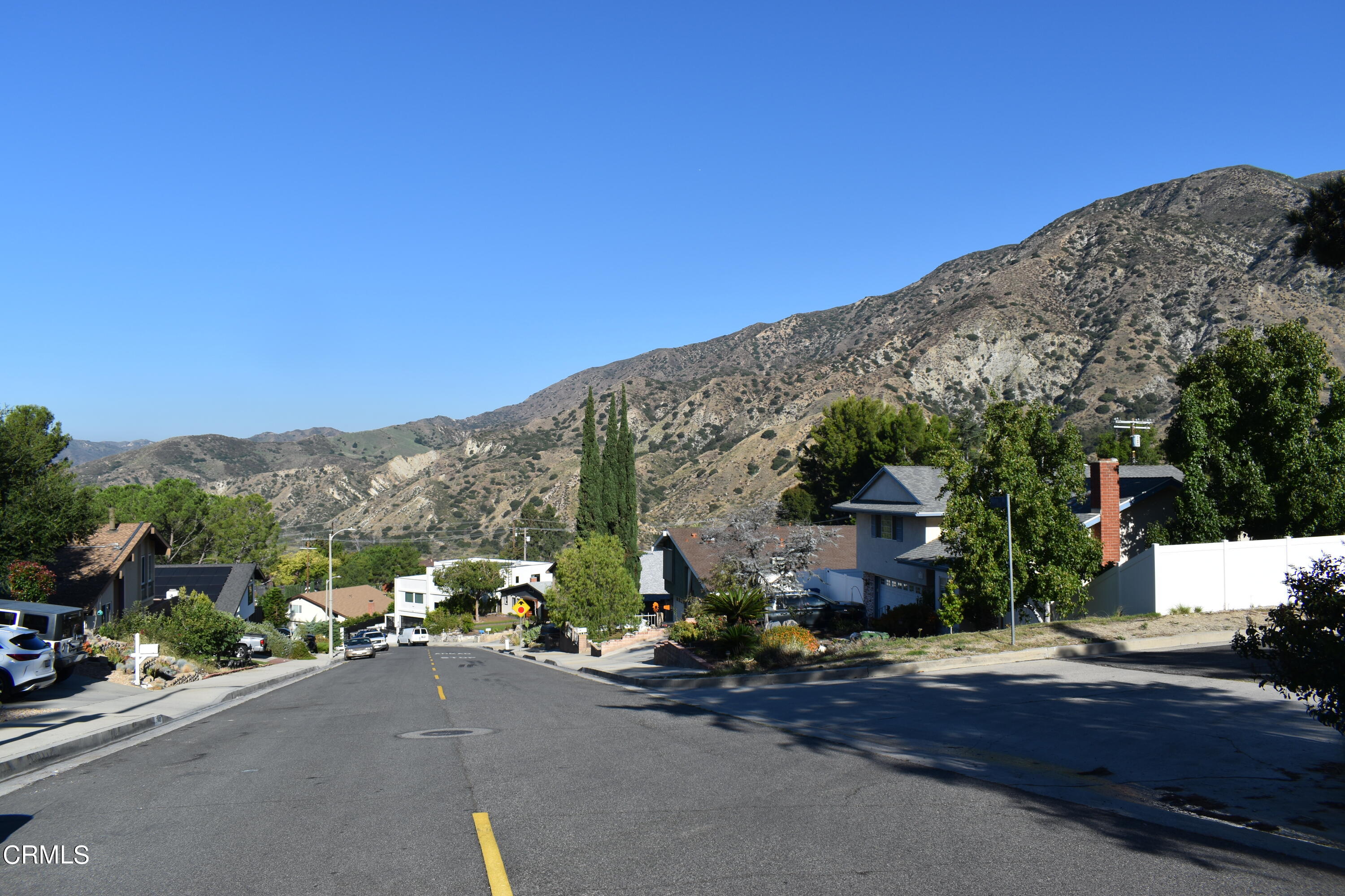 7438 Alpine Way Tujunga, CA 91042 - Photo 6 of 30 a view of a street with a house in the background