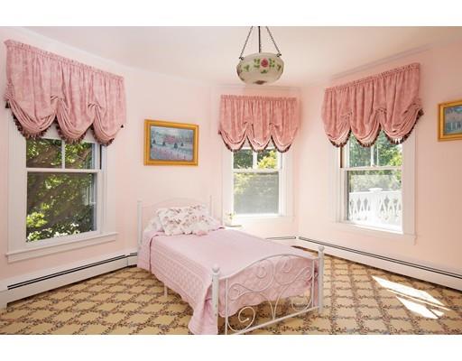 144 Nehoiden Road Newton, MA 02468 - Photo 12 of 17 a bedroom with a bed and a window