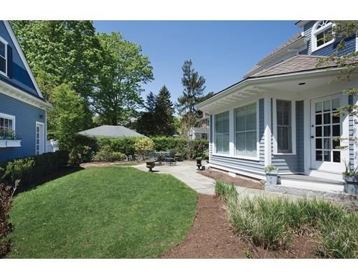 144 Nehoiden Road Newton, MA 02468 - Photo 15 of 17 a view of a house with backyard garden and sitting area