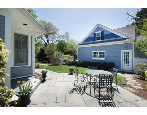 144 Nehoiden Road Newton, MA 02468 - Photo 16 of 17 a view of a house with backyard sitting area and garden