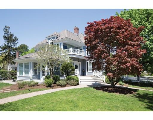 144 Nehoiden Road Newton, MA 02468 - Photo 3 of 17 a front view of a house with a garden
