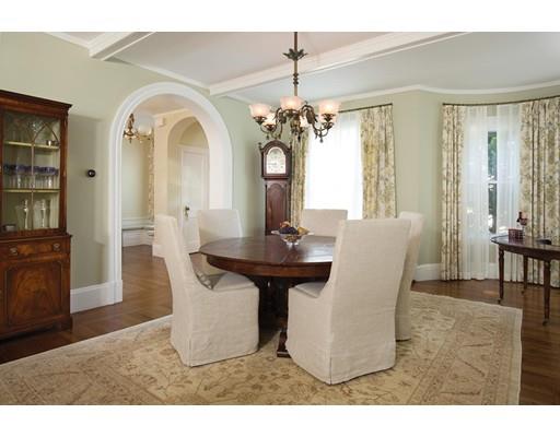 144 Nehoiden Road Newton, MA 02468 - Photo 6 of 17 a view of a dining room with furniture and a chandelier