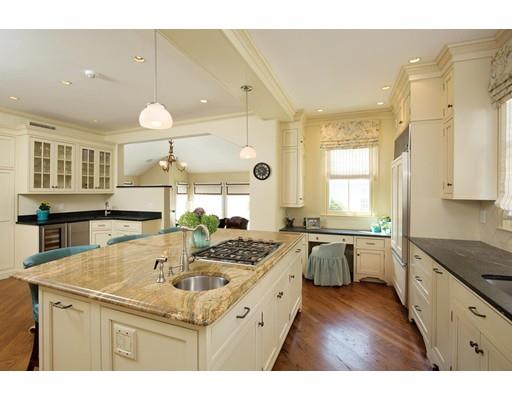 144 Nehoiden Road Newton, MA 02468 - Photo 7 of 17 a kitchen with a sink a stove a refrigerator and a microwave