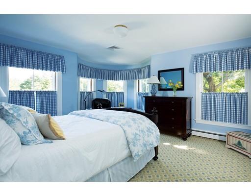 144 Nehoiden Road Newton, MA 02468 - Photo 10 of 17 a bedroom with a bed and a television