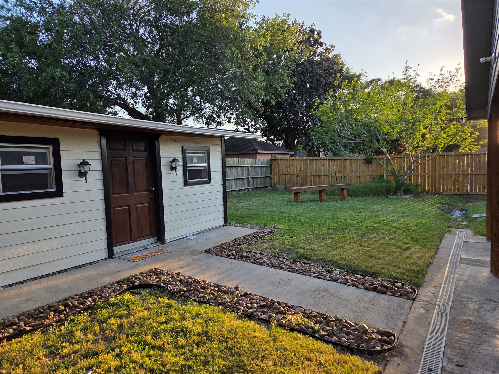 15415 Beechnut Street Houston, TX 77083 - Photo 20 of 28 a view of a backyard with a garden