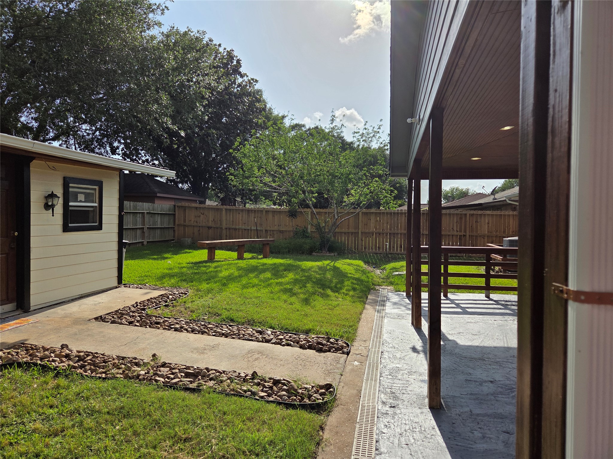 15415 Beechnut Street Houston, TX 77083 - Photo 24 of 28 a view of a backyard with a garden and plants
