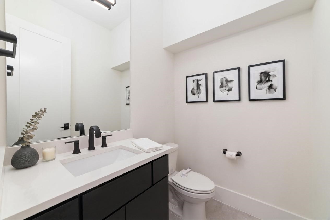 29627 Cir S Rnch Trail Fulshear, TX 77406 - Photo 13 of 50 Even the powder bath carries the home's contemporary style with designer finishes and thoughtful attention to detail.