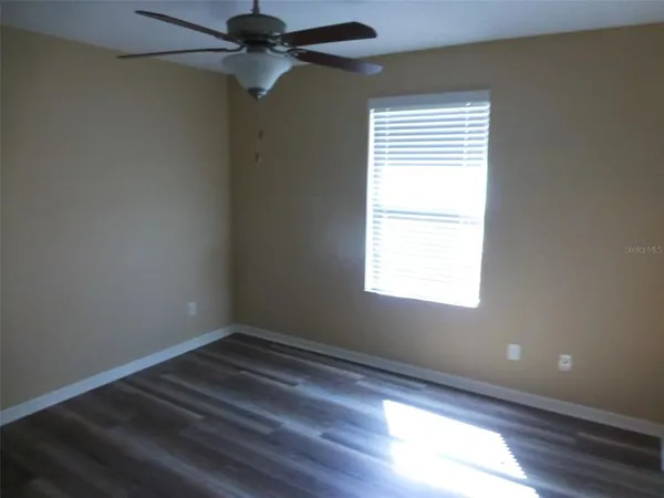 en empty room with a window