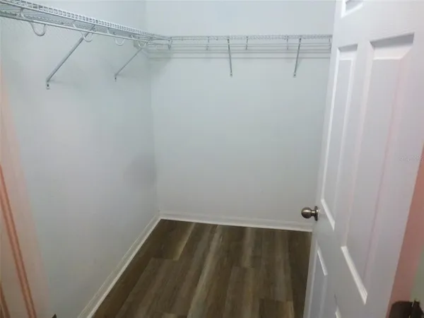 a view of a room with racks on the wall