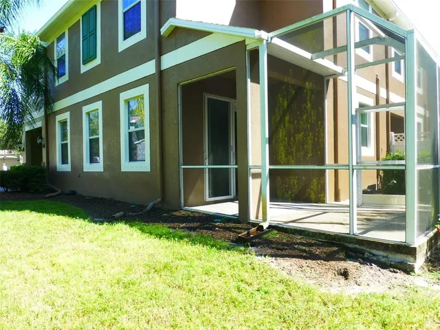 a front view of a house having yard