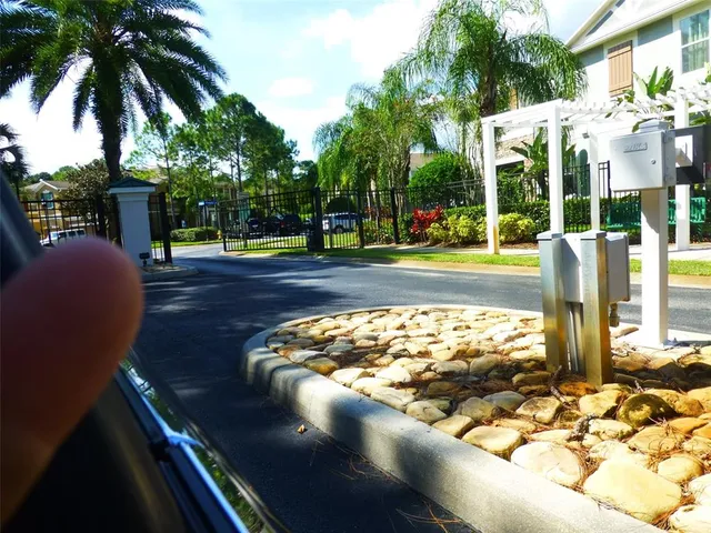 a view of a yard with furniture