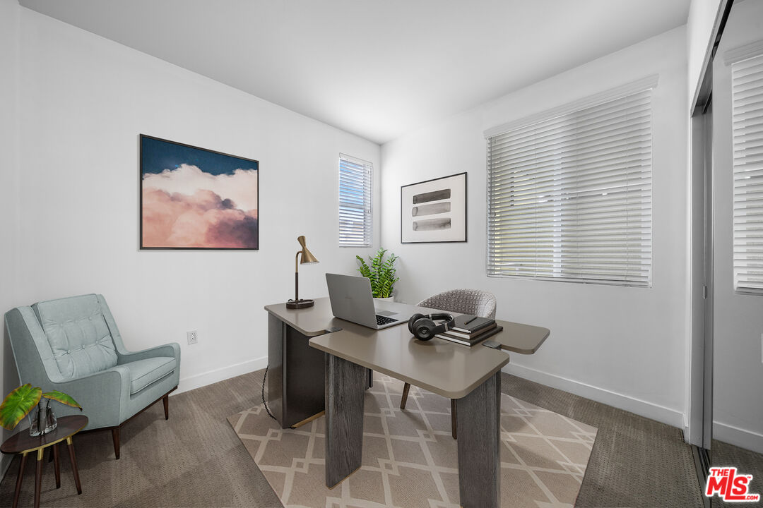 436 South Virgil Avenue, Unit 407 Los Angeles, CA 90020 - Photo 5 of 16 a workspace with furniture and window