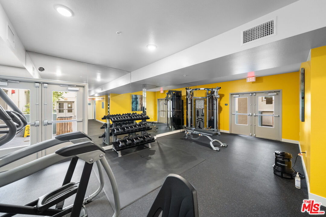 436 South Virgil Avenue, Unit 407 Los Angeles, CA 90020 - Photo 10 of 16 a view of a room with gym equipment