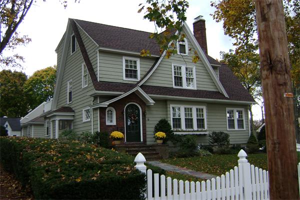 6 Virginia Road Reading, MA 01867 - Photo 1 of 1 a front view of a house with a garden