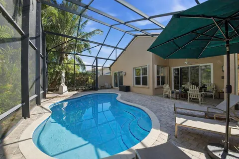 a view of outdoor space with swimming pool