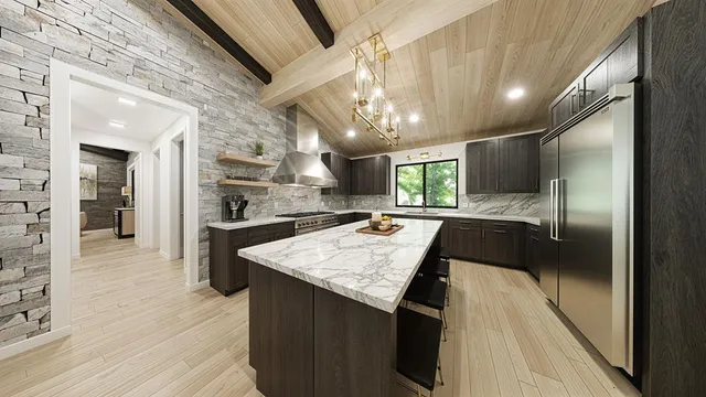 a large kitchen with a large counter top appliances and cabinets