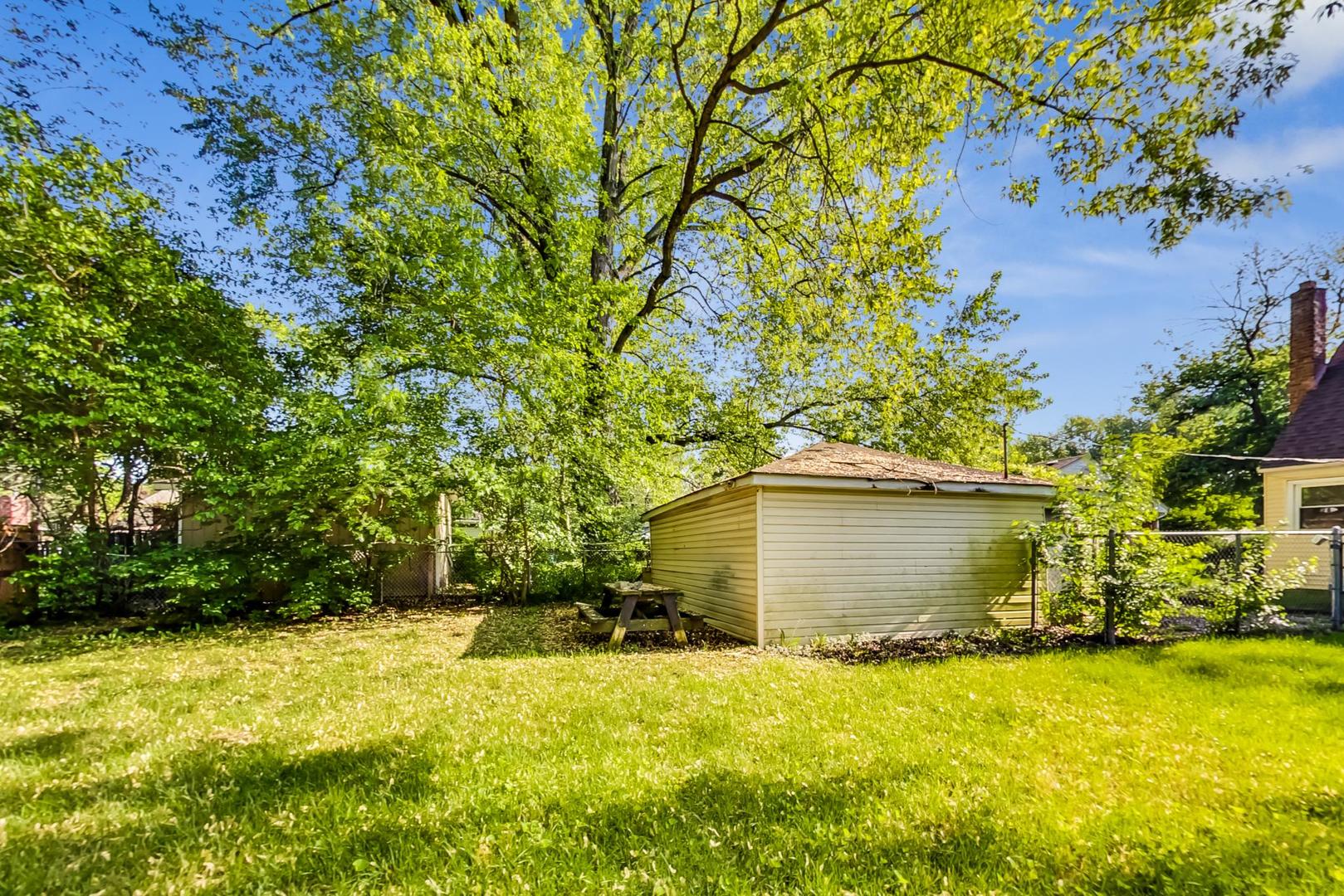 15545 Ridgeway Avenue Markham, IL 60428 - Photo 26 of 28 a view of backyard of house with green space