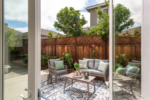 a view of yard with patio