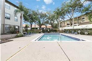 956 Salt Pond Place, Unit 304 Altamonte Springs, FL 32714 - Photo 4 of 5 a view of outdoor space with swimming pool and patio