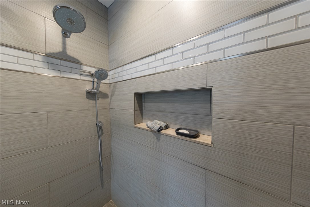 6150 Liberty Road Solon, OH 44139 - Photo 20 of 29 Shower detail in master bath show clean lines and smart use of space.