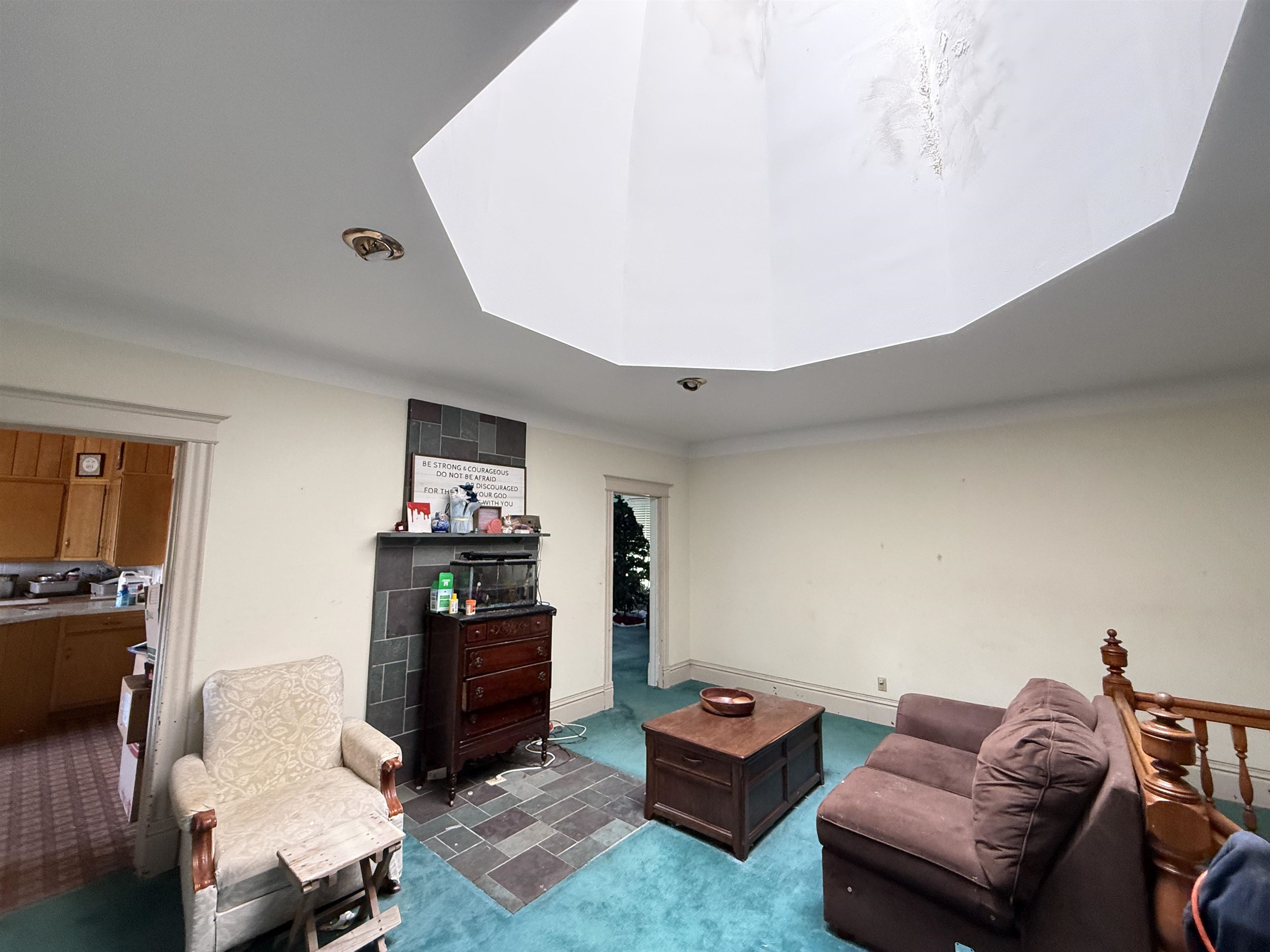 323 South Main Street Stockton, IL 61085 - Photo 11 of 32 a living room with furniture and a flat screen tv