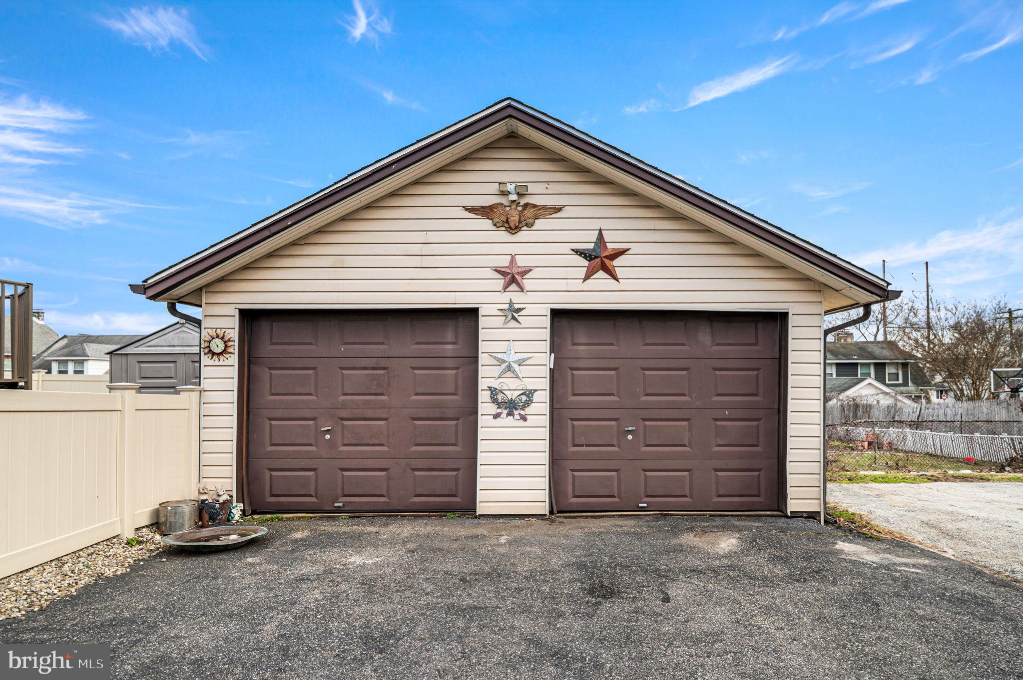 235 Ardmore Avenue Upper Darby, PA 19082 - Photo 20 of 23 a front view of a house with garage