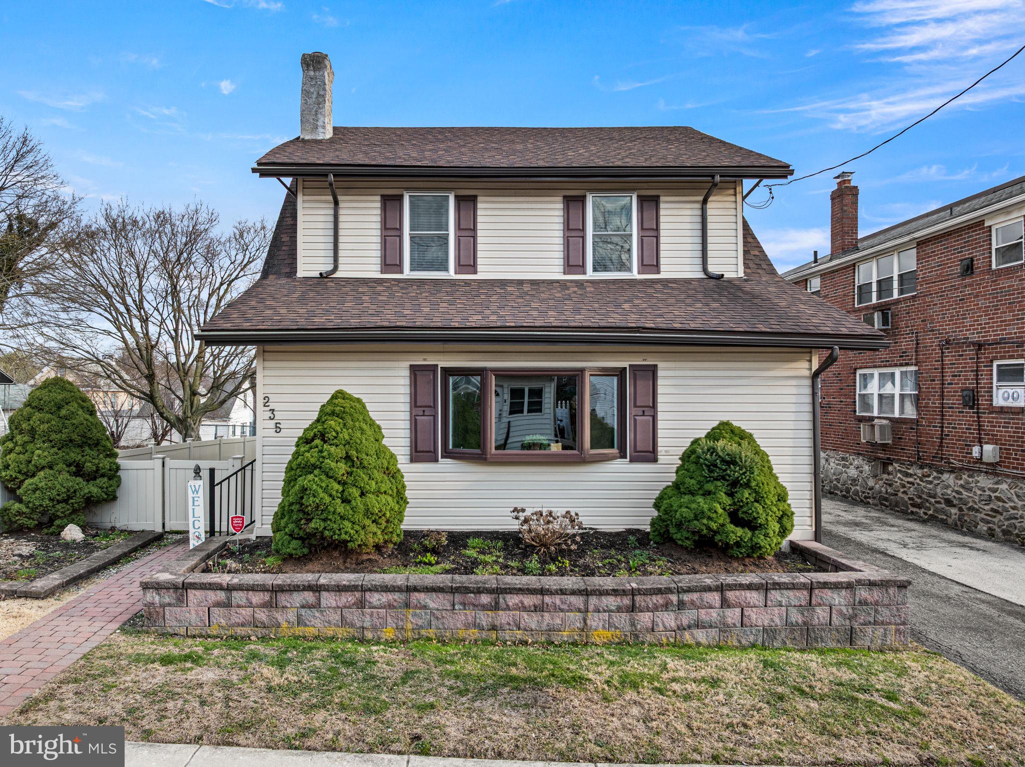 235 Ardmore Avenue Upper Darby, PA 19082 - Photo 2 of 23 a front view of a house with garden