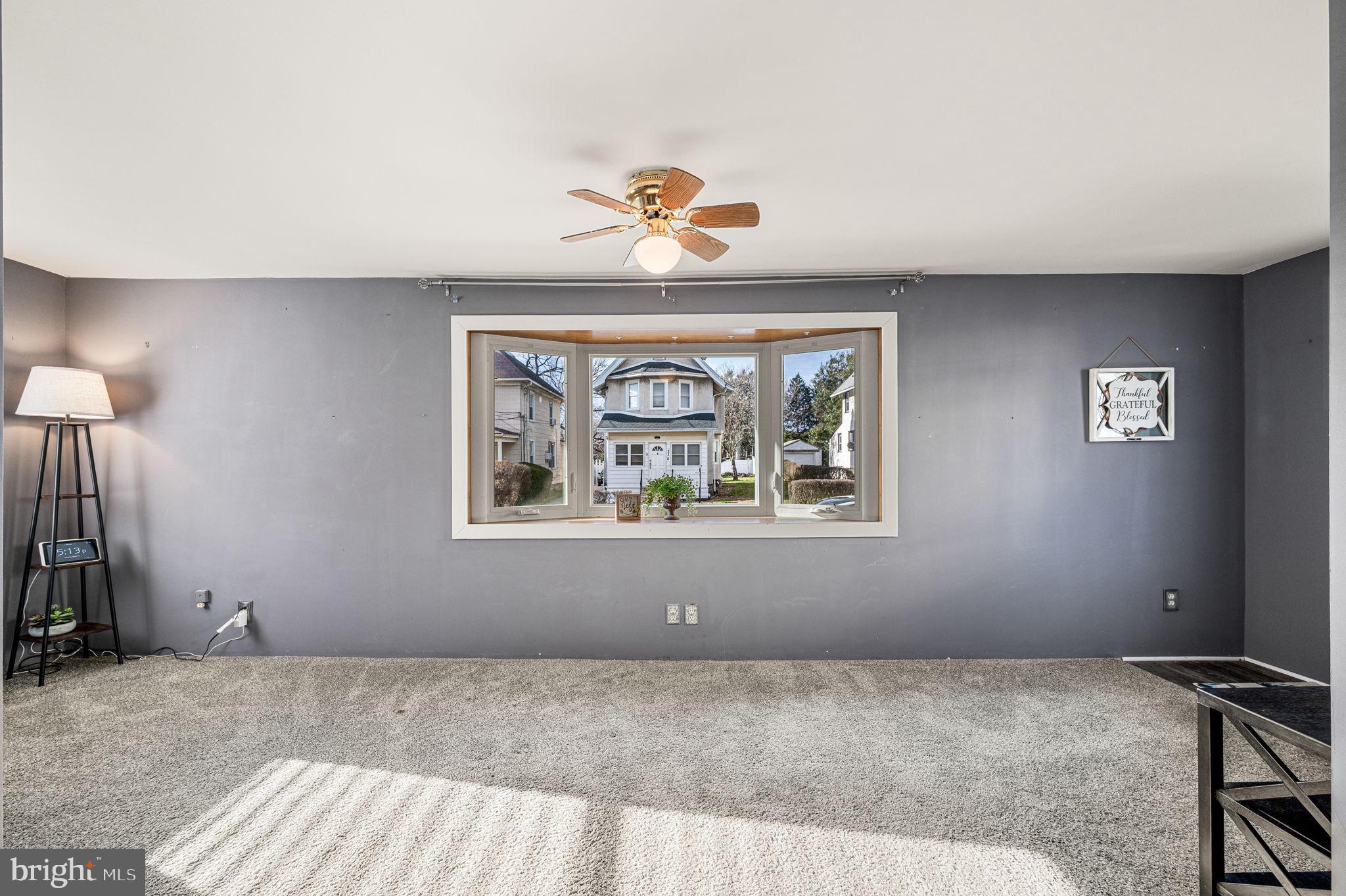 235 Ardmore Avenue Upper Darby, PA 19082 - Photo 4 of 23 a view of a livingroom with a window