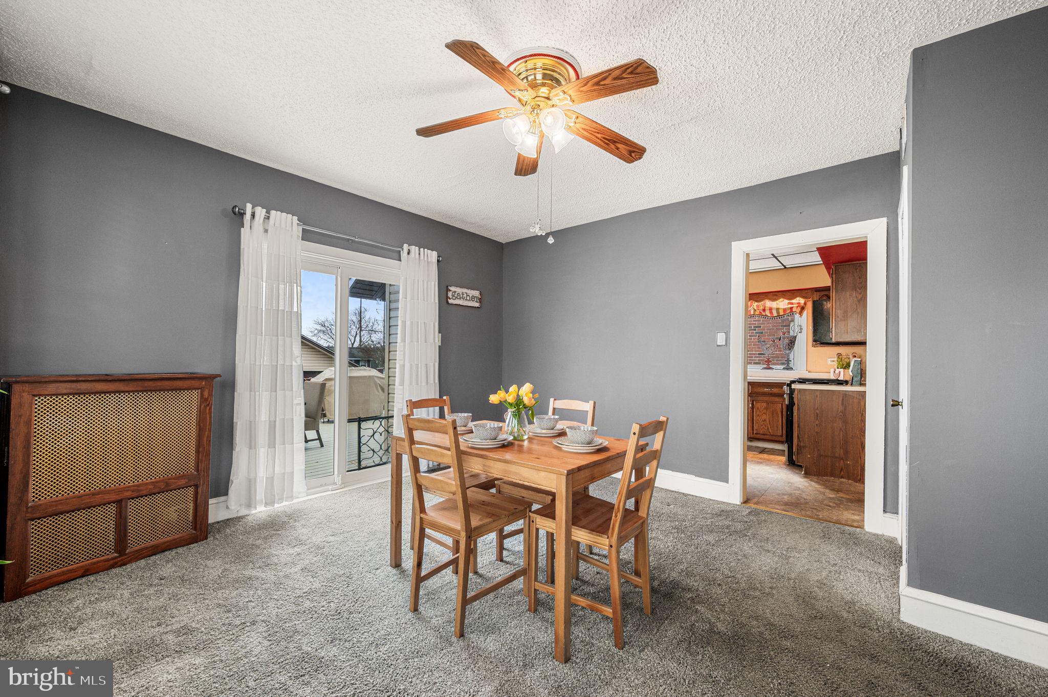 235 Ardmore Avenue Upper Darby, PA 19082 - Photo 8 of 23 a dining room with furniture and chandelier