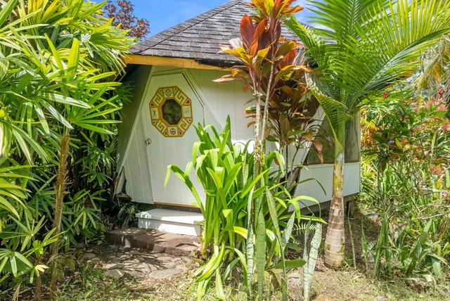 a backyard of a house with lots of green space