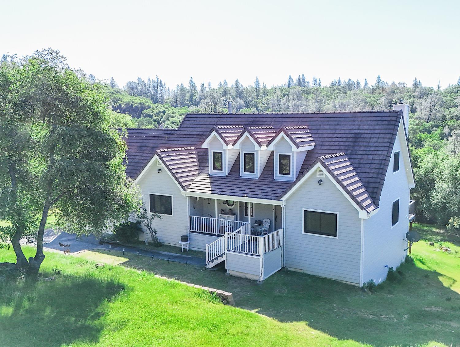 Undisclosed Address Auburn, CA 95602 - Photo 1 of 1 a front view of a house with garden