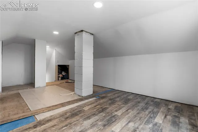 a kitchen with stainless steel appliances a stove a refrigerator and cabinets