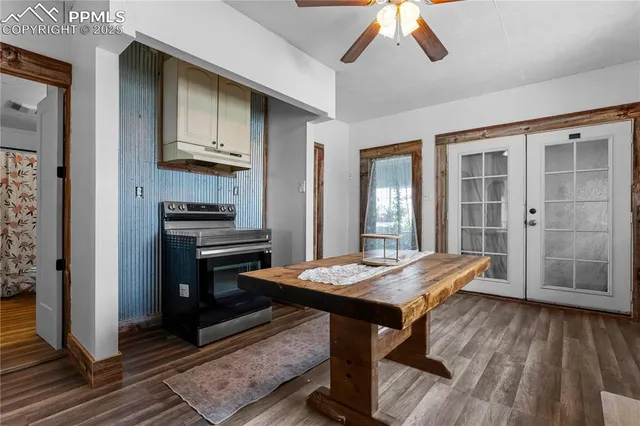 a room with furniture and wooden floor