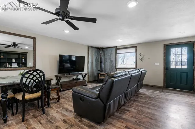 a kitchen with a refrigerator and a stove