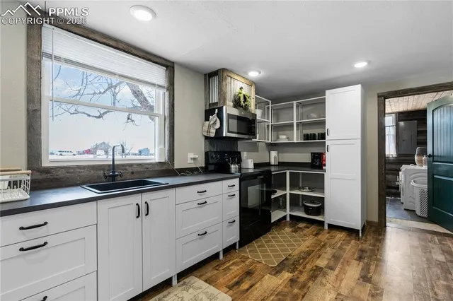 a view of wooden floor and a fireplace