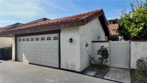 a wooden house with a outdoor space