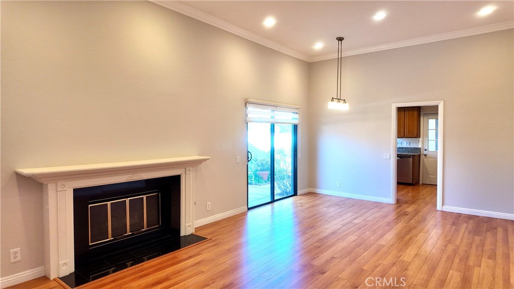 17 Filare Irvine, CA 92620 - Photo 2 of 16 a view of an empty room with window and wooden floor